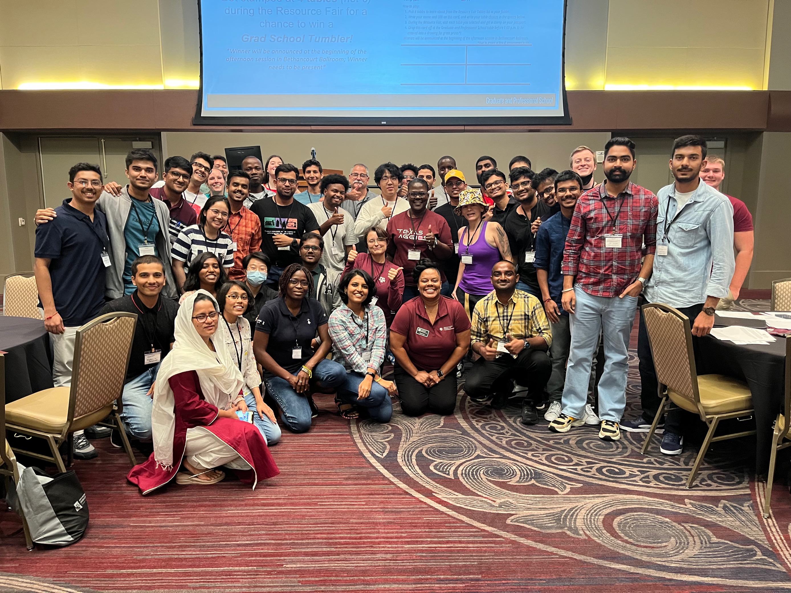 A photo of Aimee Lay with incoming students at New Graduate Student Orientation