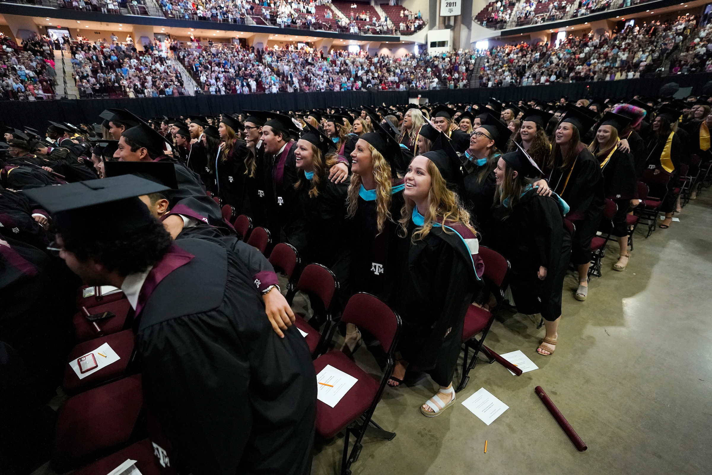 graduate and professional students singing the war hymn at commencement